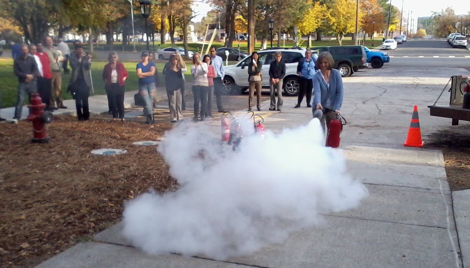 Putting out fires at EWU Fire Extinguisher Training