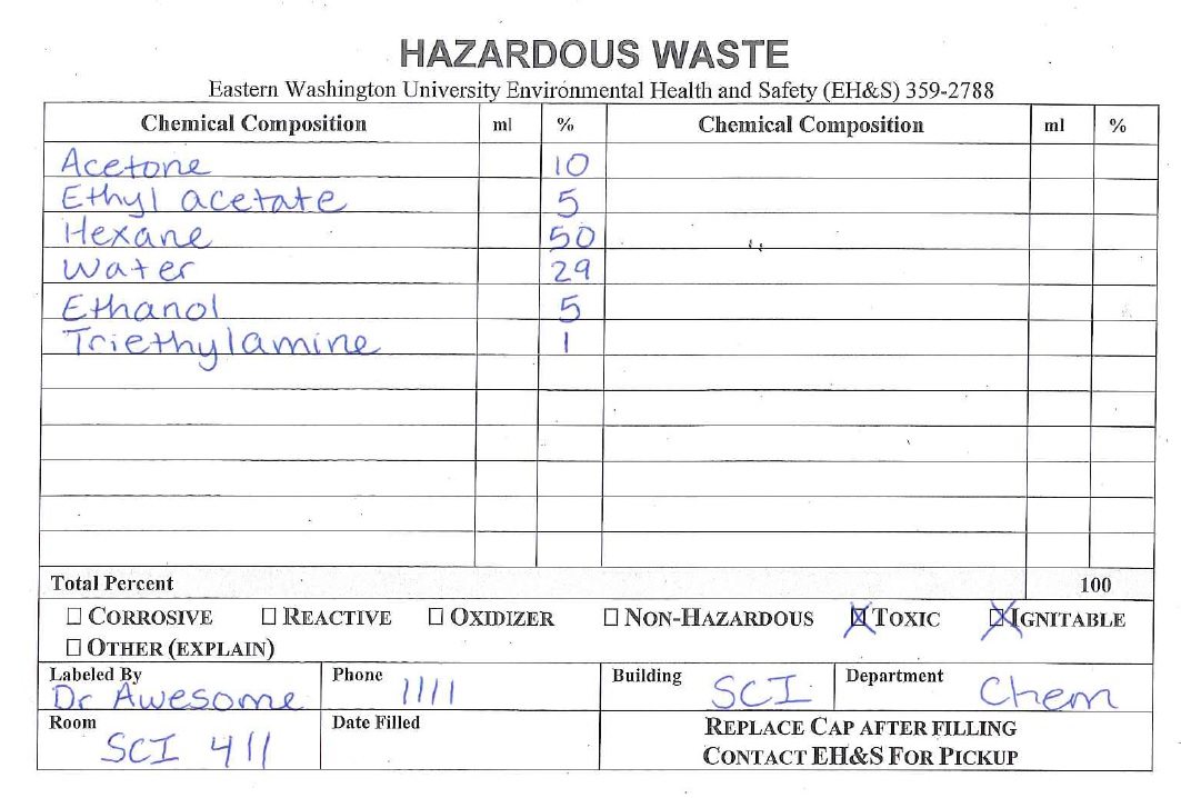 Example hazardous waste label with components hand written.