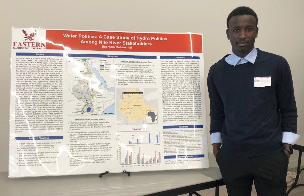 Badradin Mohammed presents his research proposal poster, Water Politics: A Case Study of Hydro Politics Among Nile River Stakeholders