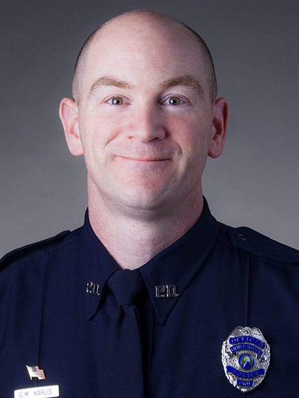 Greg Karlis, Officer