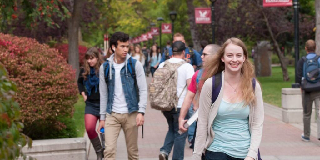 Students walking on campus pathway