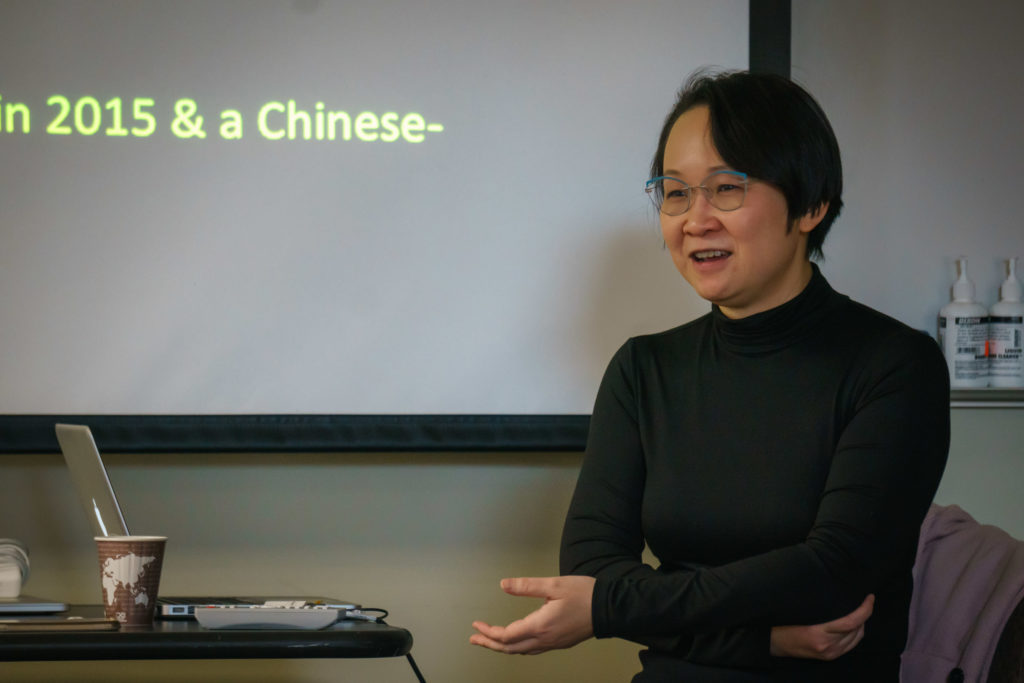 Dr. Pui-Yan Lam addresses the audience